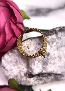 Elegant Gold Ring with Crystal