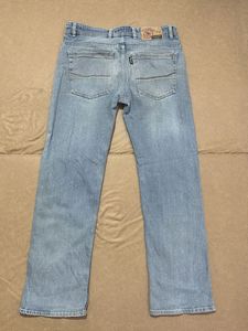 Light Wash Denim Jeans with Embroidered Detail