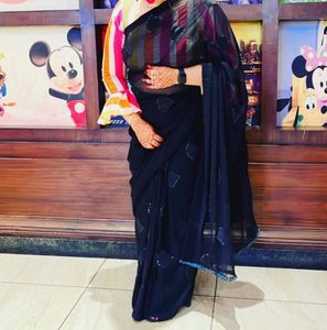 Elegant Black Saree with Unique Blouse