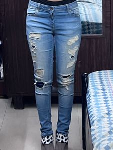 Distressed Light Wash Denim Jeans