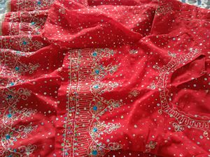 Stunning Red Embellished Lehenga Choli