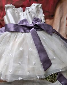 Elegant White Baby Dress with Purple Bow