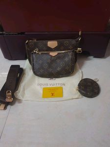 Louis Vuitton pochette With Pink Belt