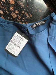 Blue top with cut work sleeves