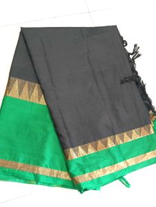 Elegant Black Saree with Green Blouse