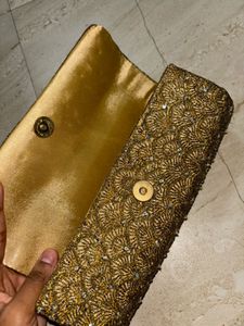Golden Hand Clutch