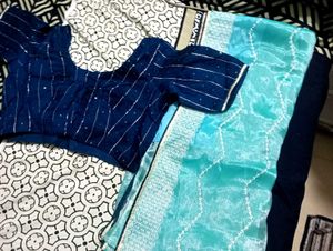 see blue saree with contrast blouse