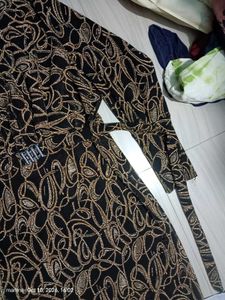 Elegant Printed Midi Dress with Belt