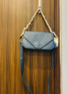 Chic Blue Crossbody Bag with Scarf Detail