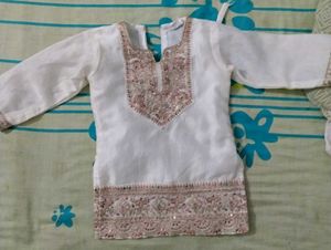 Elegant White Kurta Set with Intricate Embellishme