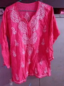 Vibrant Pink Kurta with Intricate White Embroidery