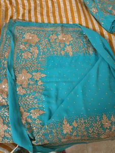 Turquoise Saree with Gold Embellishments