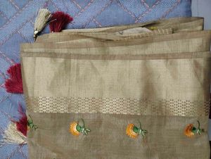 Elegant Embroidered Tassel Saree