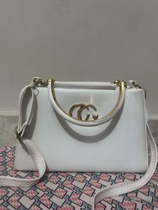 Chic White Handbag with Gold Accent