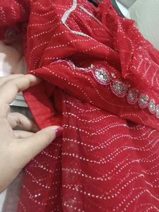 Stunning Red gand stone work saree with blause net
