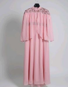 Elegant Pink Dress with Cape Detail