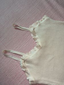 Cream Ribbed Camisole with Ruffle Trim
