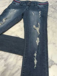 Distressed Denim Jeans.