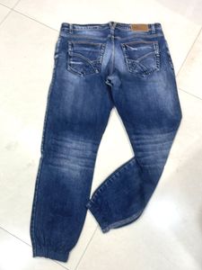 Men's Blue Distressed Denim Jogger Jeans