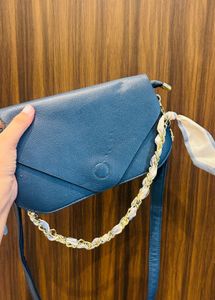 Chic Blue Crossbody Bag with Scarf Detail