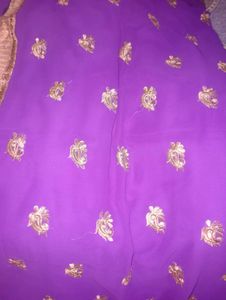 Vibrant Purple Saree with Gold Embellishments