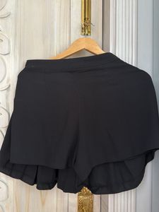 Black Pleated Mini Skirt with Buttons