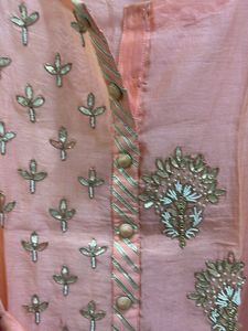 Elegant Peach Embroidered Kurta with inner skirt