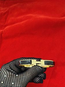 Gold &amp; Black H Bangle Bracelet