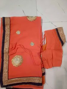 Orange Saree with Embroidered Blouse