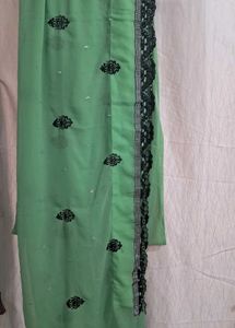 Elegant Sea Green Saree with Black Embellishments
