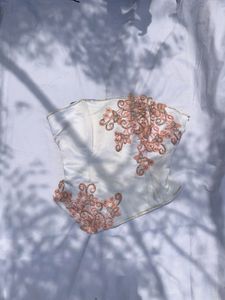 pretty white embroidered corset