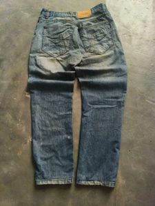 Faded Vintage Replay Jeans with multiple buttons