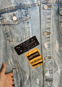 Distressed Denim Jacket with Art Patch