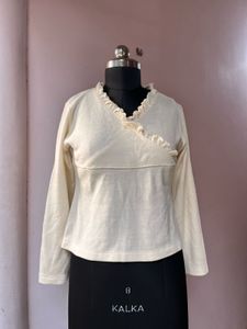 Ruffled Cream Top