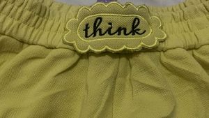 Cute Yellow Shorts with "think" patch