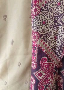 dark cream saree with beautiful India bordering