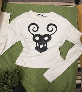 White Long Sleeve Graphic Top