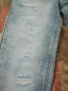 Men's Distressed Light Wash Jeans