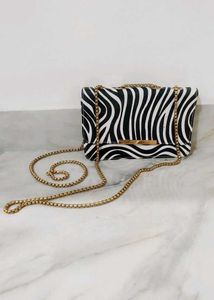 Zebra Print Clutch Bag with Gold Chain