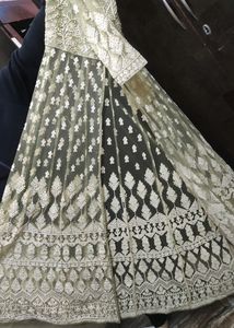Party Wear Lehnga With Embroided Long Jacket.
