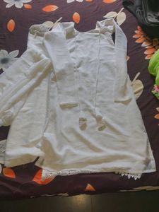 Elegant White Kurta with Intricate Embellishments