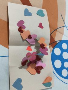 Bow, flower and heart greeting card