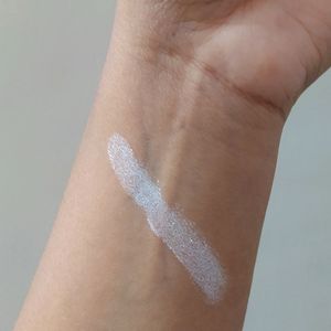 Silver Highligher and a brush