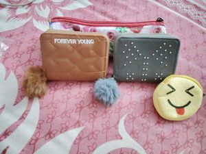 25.Cute Wallets with Pom Poms