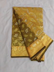 Beautiful Golden Saree with Paisley Motifs