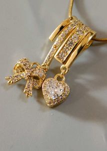Sparkling Bow & Heart Pendant Necklace