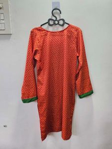 Orange Printed Kurta with Green Neckline