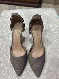 shiny pair of stelletoes