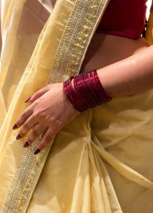 Elegant Cream Saree with Golden Border