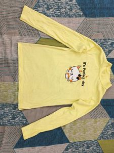 high neck pastel yellow top with embroiderd cat